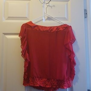 Red sequence blouse.
